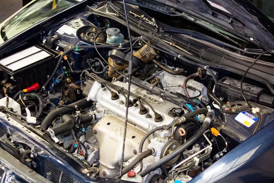 Close-up view of an open car engine bay