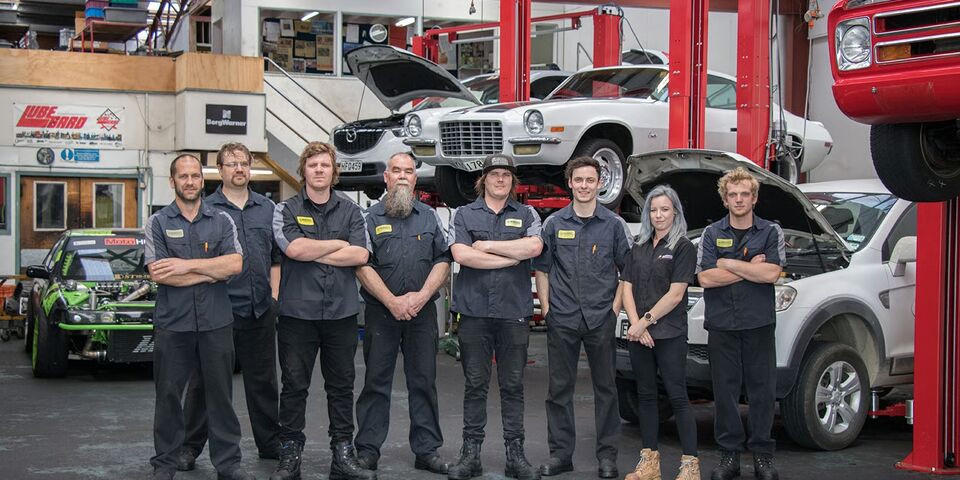 Marshall Transmissions & Automotive team standing together in the workshop